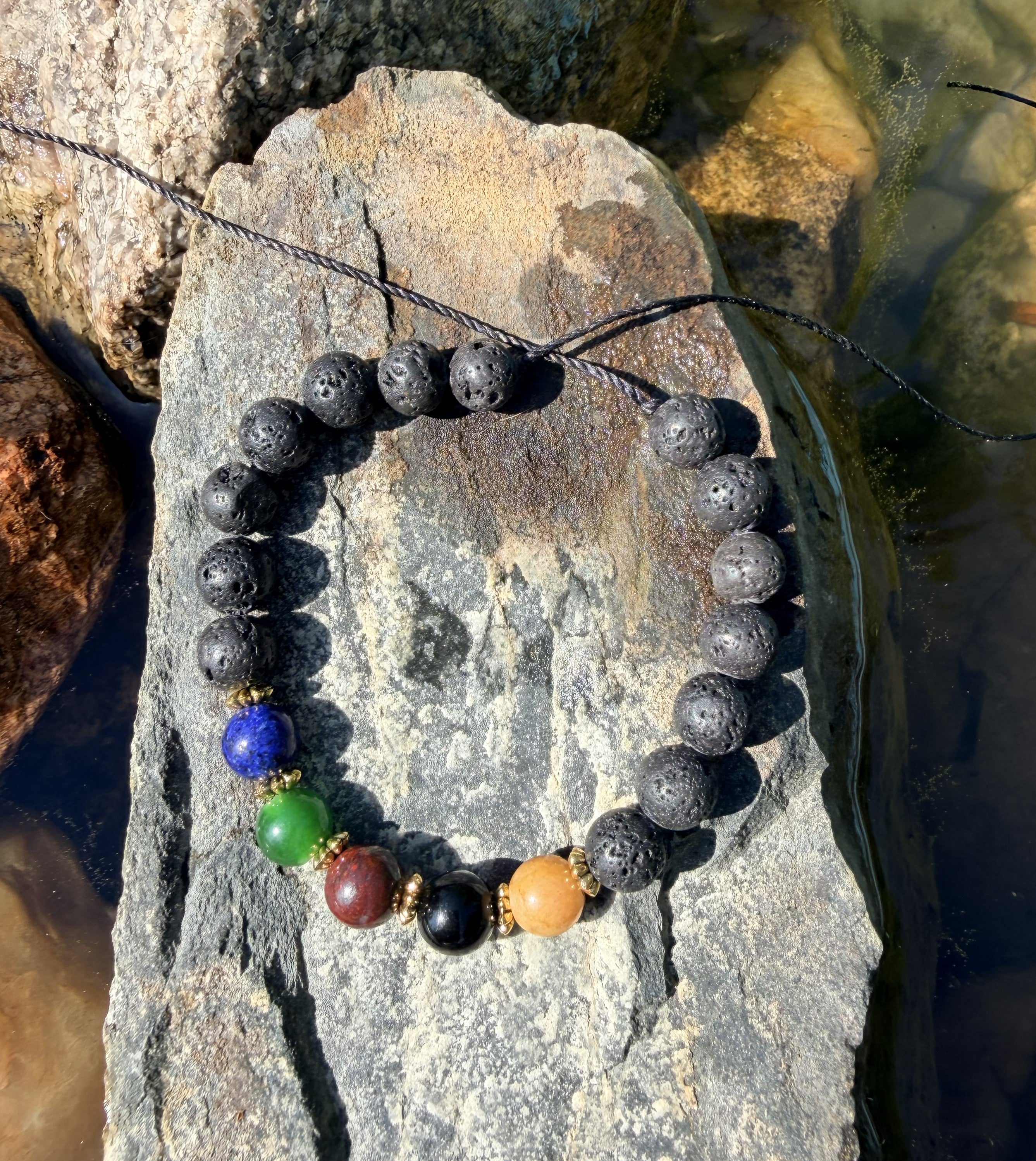 0002 - Black lava with lapis lazuli, green jade, poppy jasper, black obsidian & yellow jade