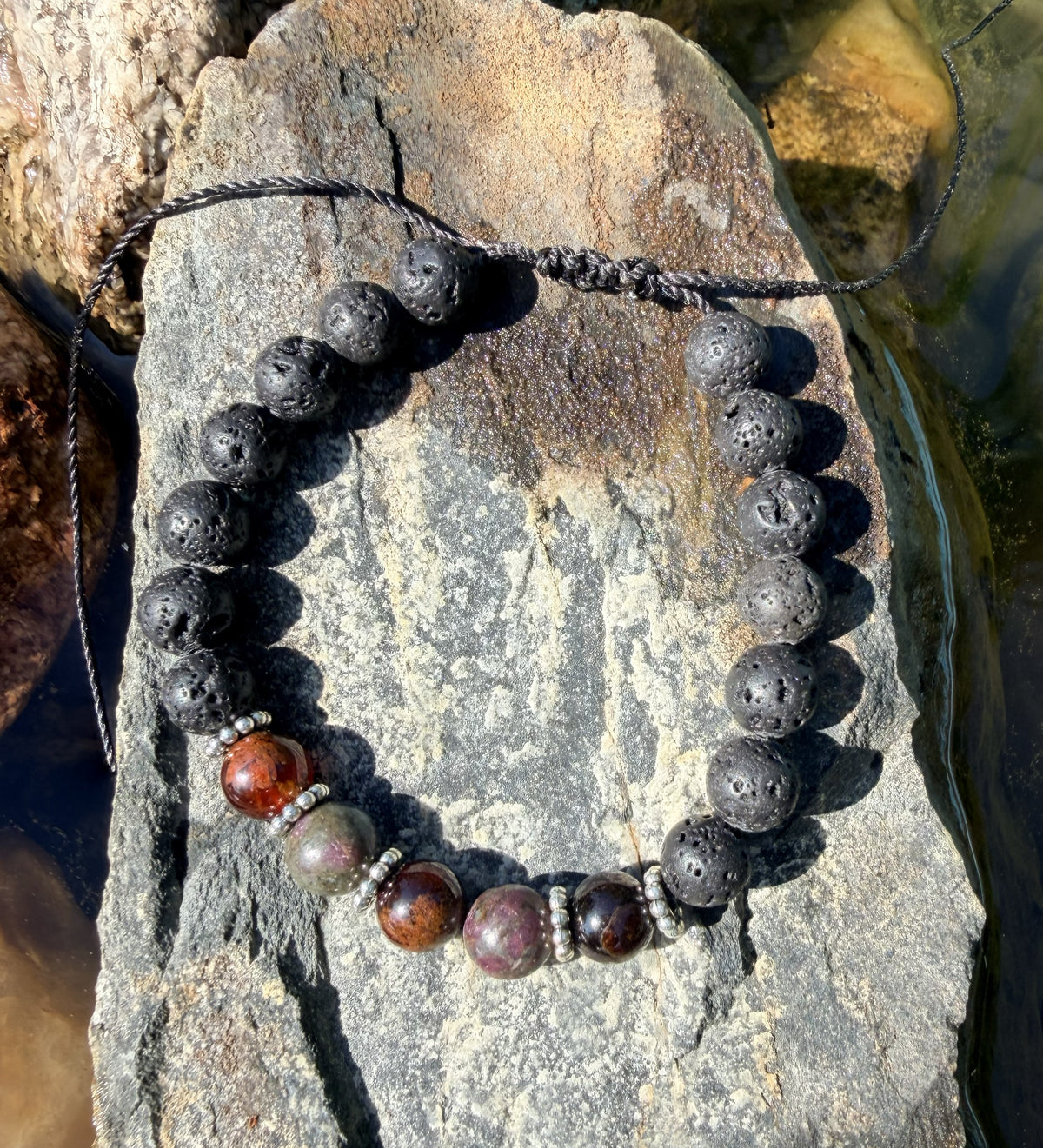 0013 - Black lava with ruby kyanite & garnet