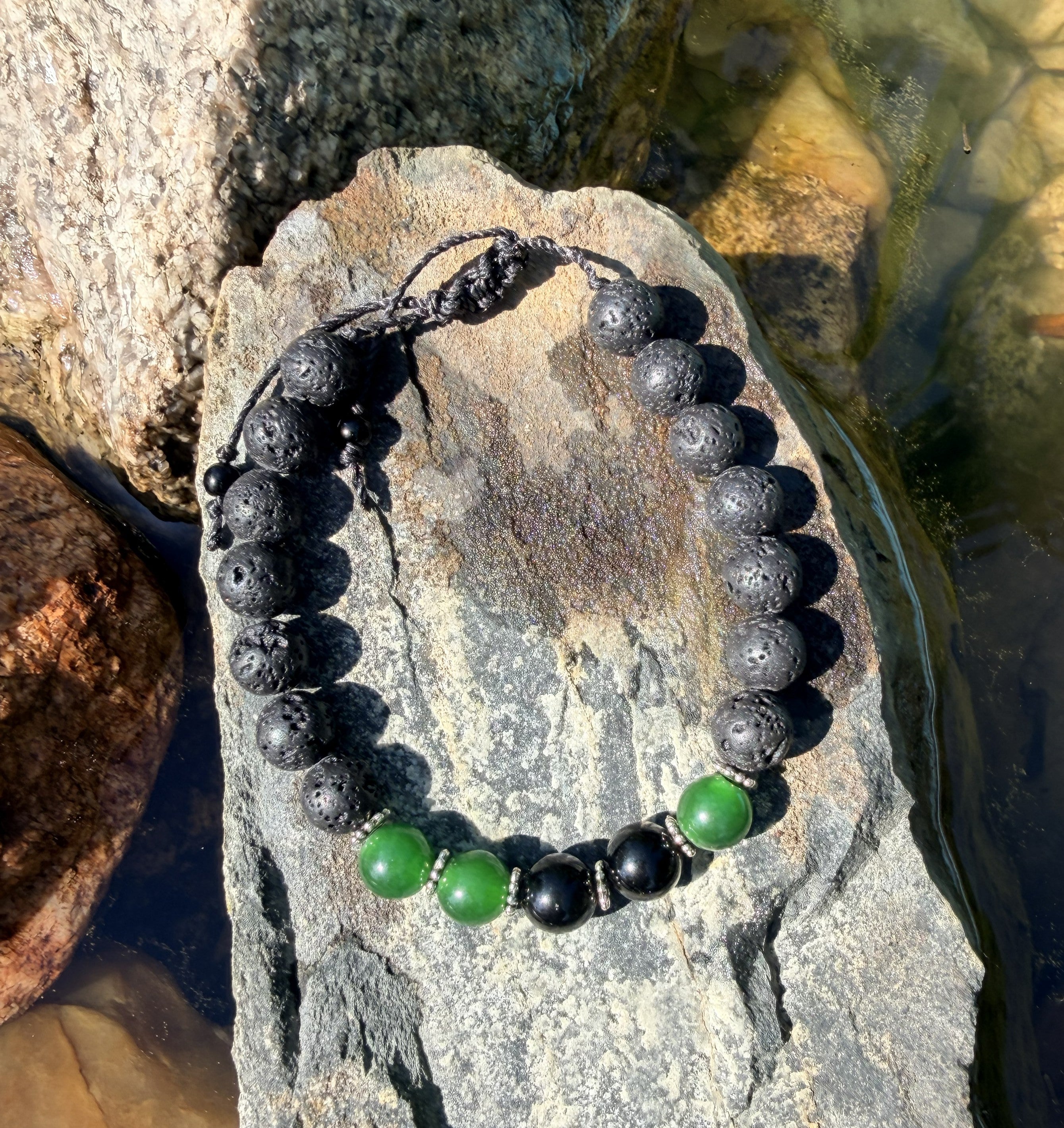 0014 - Black lava with green jade & black obsidian