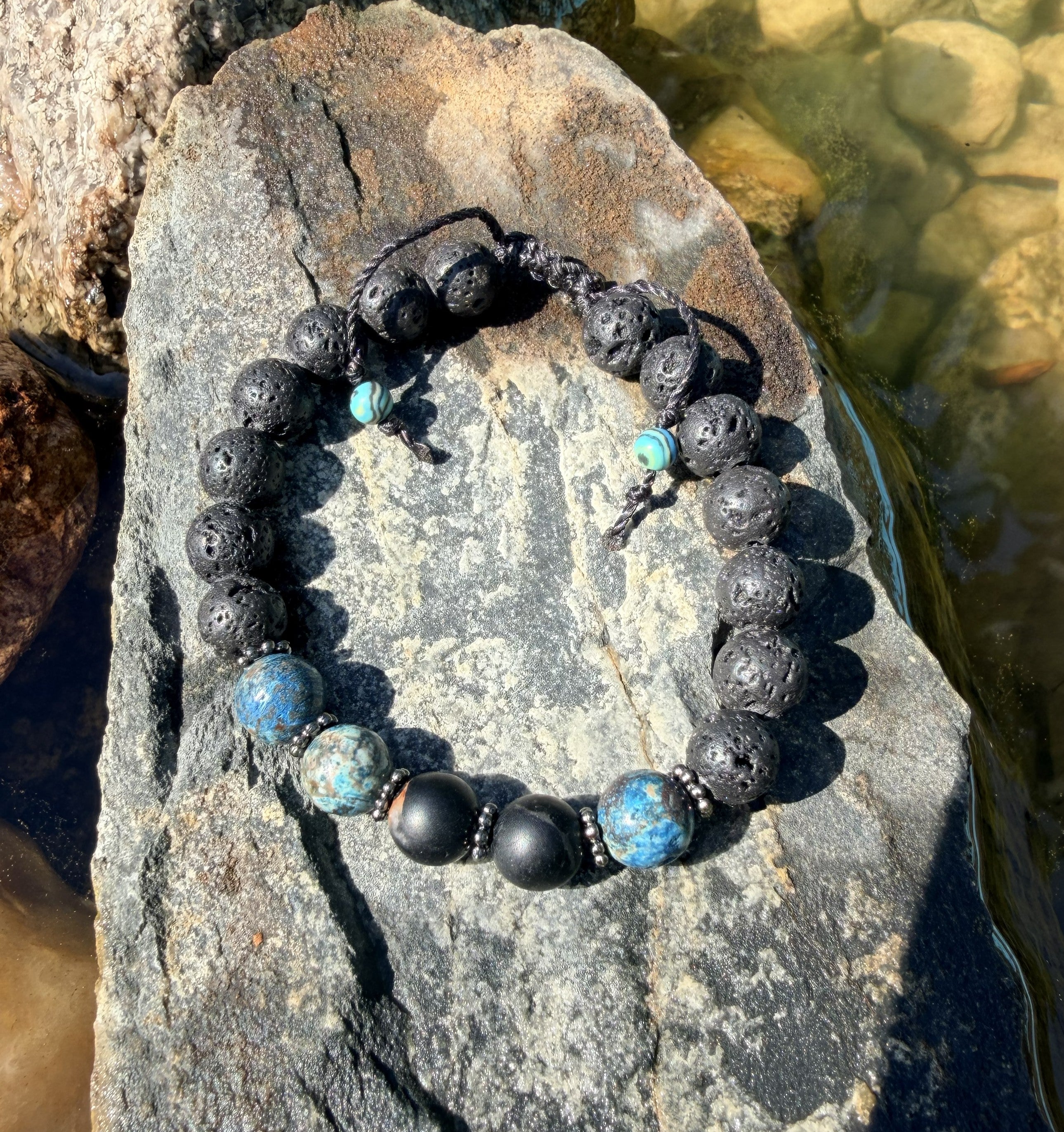 0018 - Black lava with tourquois & black tourmaline