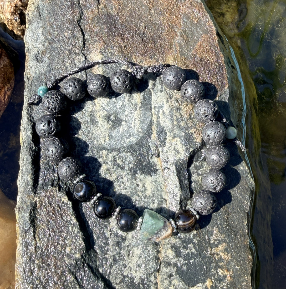 0023 - Black lava with sardonyx & roughcut rainbow flourite