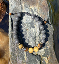 0025 - Black lava with cats eye & yellow jade