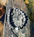 0026 - Gray lava with black tourmaline & moonstone