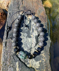 0030 - Black lava with black onyx & roughcut emerald