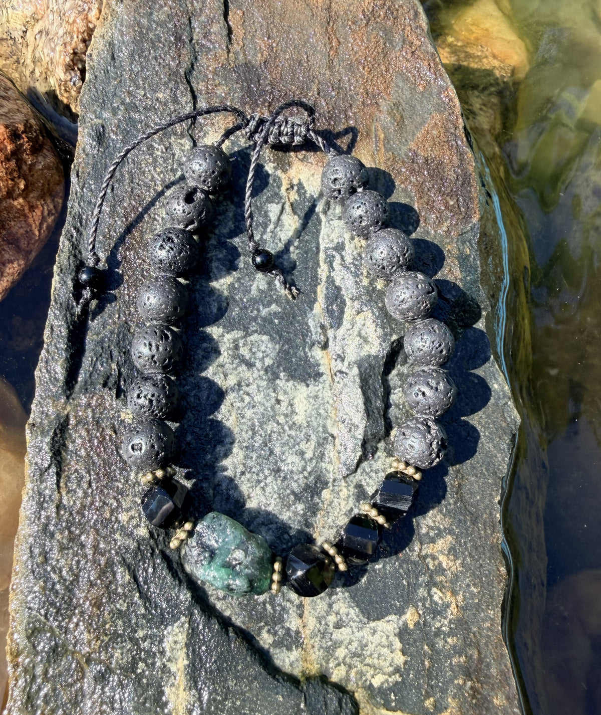 0030 - Black lava with black onyx & roughcut emerald