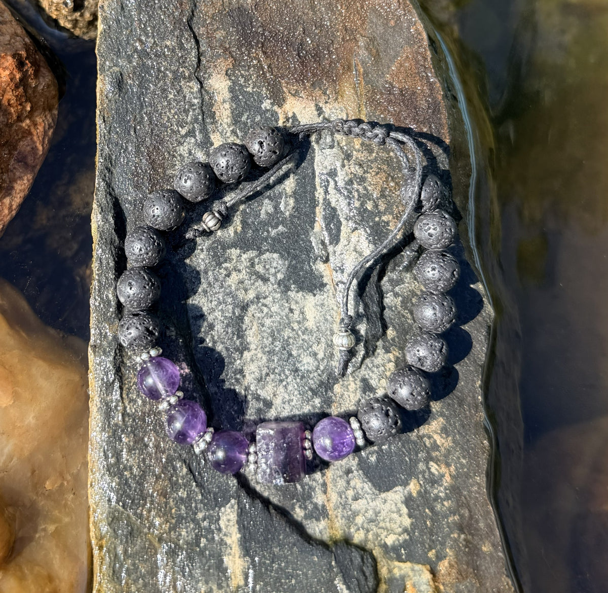 0031 - Black lava with amethyst & roughcut rainbow tourmaline