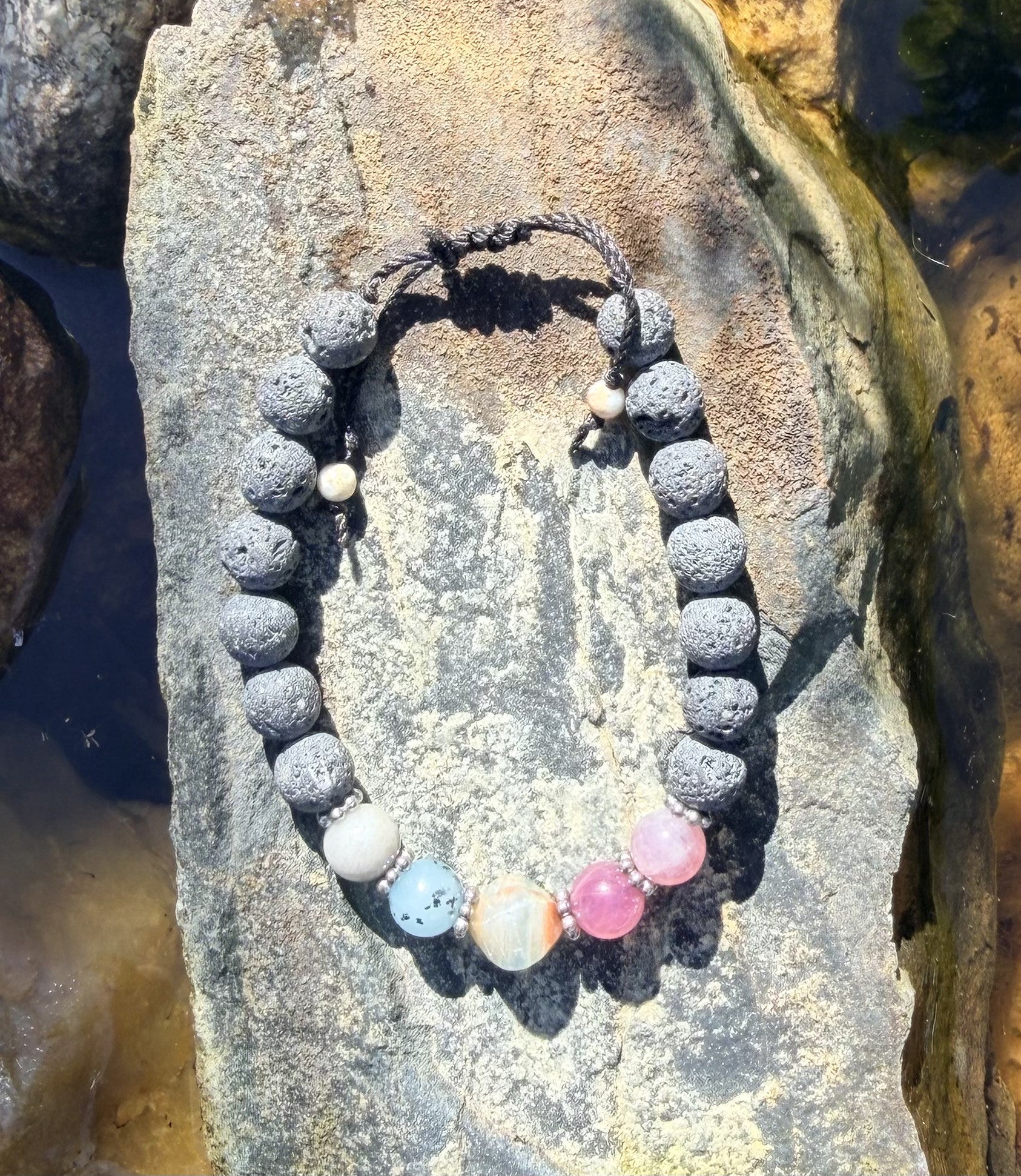0037 - Gray lava with aquamarine, aquatine calcite & rose quartz