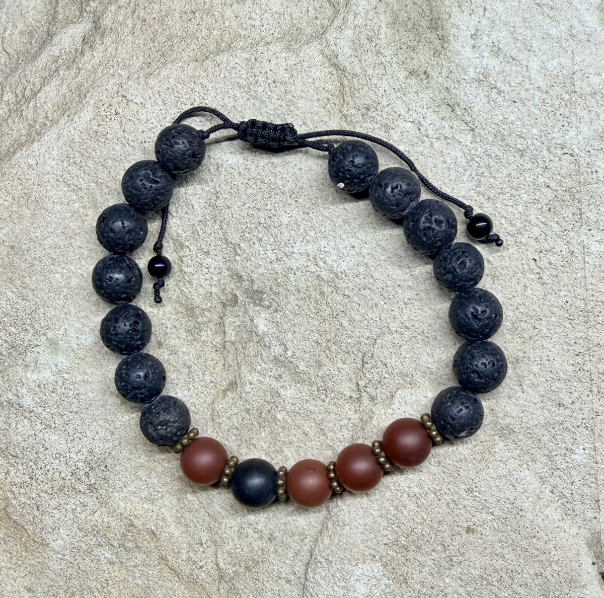 0039 - Black lava with tourmaline & carnelian