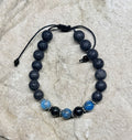 0041 - Black lava with blue apatite & arfvedsonite