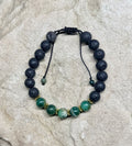 0048 - Black lava with green mica