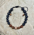 0049 - Black lava with red rutile quartz & moonstone