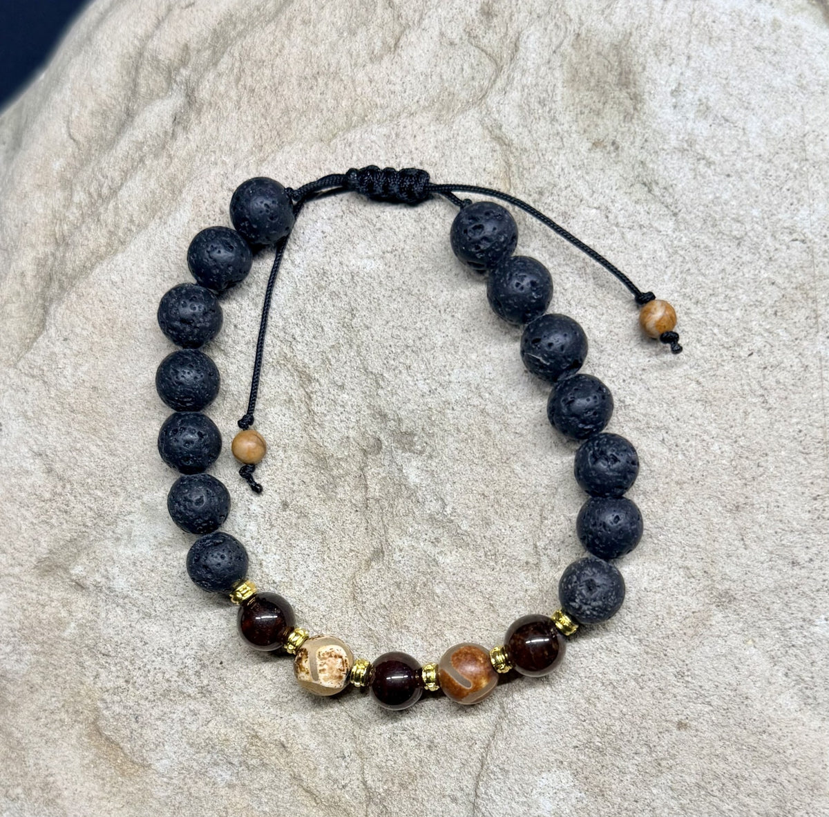 0051 - Black lava with garnet and brown agate (dZi)