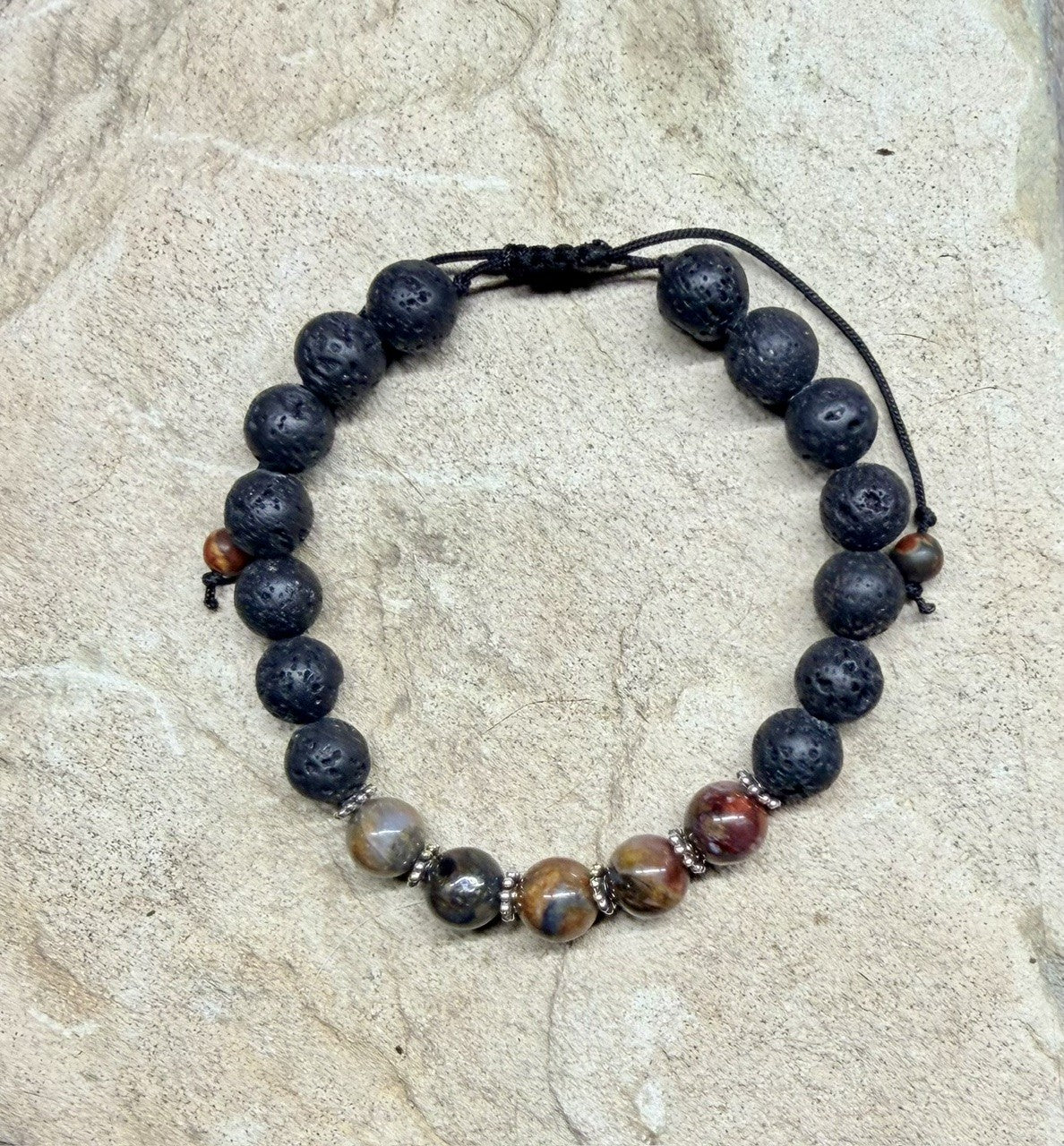 0054 - Black lava with pietersite