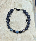 0058 - Black lava with ruby kyanite & arfvedsonite