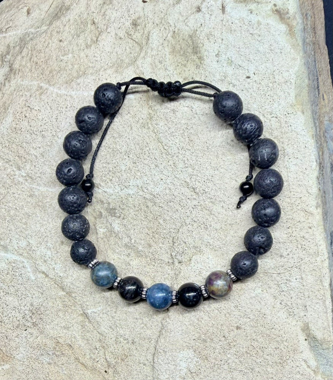 0058 - Black lava with ruby kyanite & arfvedsonite